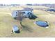 Aerial view of backyard featuring the home, shed, pool and fenced in land at 7418 W Old Sr 252, Edinburgh, IN 46124