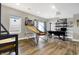 Spacious basement featuring a basketball arcade game, bunk beds, and a modern workstation by the sliding door at 7418 W Old Sr 252, Edinburgh, IN 46124