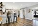 Stylish kitchen featuring white cabinets, stainless steel appliances, and bar stool seating at the counter at 7418 W Old Sr 252, Edinburgh, IN 46124
