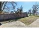 A spacious concrete patio and fenced backyard provide privacy and room for activities at 7953 Forest Park Dr, Indianapolis, IN 46217