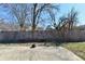 A spacious concrete patio and fenced backyard provide privacy and room for activities at 7953 Forest Park Dr, Indianapolis, IN 46217