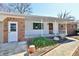Charming single-story home with brick accents, covered porch, and well-maintained landscaping at 7953 Forest Park Dr, Indianapolis, IN 46217