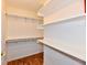 Walk-in closet offering ample shelving and space for storage and organization at 7953 Forest Park Dr, Indianapolis, IN 46217