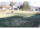 Large backyard featuring a firepit, mature trees and an additional building at 8137 S Delaware St, Indianapolis, IN 46227