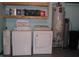 Laundry room featuring a washing machine and dryer, ready for your laundry needs at 8137 S Delaware St, Indianapolis, IN 46227