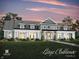 Inviting large clubhouse exterior with manicured lawn and lush landscaping at 9163 Bryce Cir, Zionsville, IN 46077