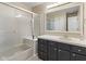 Bathroom with shower, vanity, sink, and a large mirror at 9459 Wimbledon Ct, Indianapolis, IN 46250