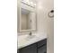 Cozy bathroom with a vanity, a well-lit mirror, and towel rack at 9459 Wimbledon Ct, Indianapolis, IN 46250