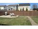 Backyard with a patio area, perfect for outdoor relaxation and gatherings featuring a fire pit and BBQ grill at 950 Kempson Ct, Westfield, IN 46074