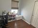 Bright spare bedroom complete with a storage area, a cozy window, and a modern blind at 950 Kempson Ct, Westfield, IN 46074