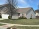 Classic single-story home with a two-car garage, brick and vinyl siding, and a neatly kept lawn at 950 Kempson Ct, Westfield, IN 46074