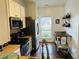 Bright kitchen showcasing modern appliances and a window with natural light at 950 Kempson Ct, Westfield, IN 46074