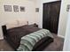 Comfortable bedroom with dark wood accents and modern decor at 9649 Cedar Cove Ln, Indianapolis, IN 46250