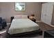Cozy bedroom with a bed, nightstand, and closet at 9649 Cedar Cove Ln, Indianapolis, IN 46250