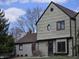 Charming home featuring unique shingle siding, a round window accent, and well-maintained landscaping at 9649 Cedar Cove Ln, Indianapolis, IN 46250
