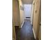 A bright hallway leads to various rooms, highlighting tile flooring and fresh, neutral paint at 9649 Cedar Cove Ln, Indianapolis, IN 46250