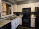 Spacious kitchen with white cabinets, stainless steel appliances, and granite countertops at 9649 Cedar Cove Ln, Indianapolis, IN 46250