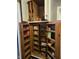 Custom pantry with roll-out shelving provides ample storage at 9649 Cedar Cove Ln, Indianapolis, IN 46250