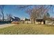 Spacious backyard featuring a shed, mature trees, and a wooden fence, perfect for outdoor enjoyment at 11144 Echo Trl, Indianapolis, IN 46236