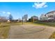 Spacious backyard featuring a basketball court, offering a fun and active space for outdoor recreation and sports at 1146 Mount Vernon Dr, Greenwood, IN 46142
