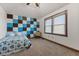 Bedroom with a unique accent wall, window, and carpeted floor at 1146 Mount Vernon Dr, Greenwood, IN 46142