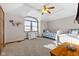 Vaulted bedroom features twin beds, a large window and a neutral color palette at 1146 Mount Vernon Dr, Greenwood, IN 46142