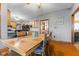 Open-concept dining room featuring wood floors and charming details at 1146 Mount Vernon Dr, Greenwood, IN 46142