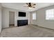 Spacious bedroom featuring carpet floors, a dresser, and a ceiling fan with a light at 11796 Sycamore St, Zionsville, IN 46077