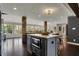 Gourmet kitchen with dual islands, granite countertops, stainless steel appliances, and abundant natural light at 11796 Sycamore St, Zionsville, IN 46077