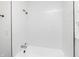 Bright white bathroom featuring a tile shower and tub combination at 1622 N Linwood Ave, Indianapolis, IN 46218