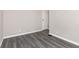 Bedroom featuring modern gray vinyl flooring and a closet at 1622 N Linwood Ave, Indianapolis, IN 46218