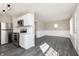 Open concept living area and kitchen featuring stainless steel appliances at 1622 N Linwood Ave, Indianapolis, IN 46218