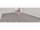 Carpeted bedroom featuring neutral paint with an open entry into the hallway with a view of additional rooms at 16429 Mount Logan Rd, Noblesville, IN 46060