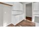 Kitchen showcasing white cabinets and a gray countertop at 16429 Mount Logan Rd, Noblesville, IN 46060