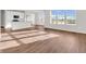 Bright and open living room with modern flooring and natural light at 16429 Mount Logan Rd, Noblesville, IN 46060