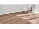 Spacious living room featuring hardwood floors, neutral walls, and plenty of natural light perfect for entertaining at 16429 Mount Logan Rd, Noblesville, IN 46060
