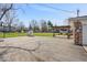 This is a large, expansive backyard with a playhouse and a patio at 1721 Rachel Dr, Plainfield, IN 46168