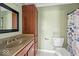 This is a traditional bathroom with a vanity and shower at 1721 Rachel Dr, Plainfield, IN 46168