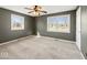 Cozy bedroom with neutral carpet, two windows, and ample natural light at 1721 Rachel Dr, Plainfield, IN 46168