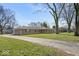 Charming single-story brick home with a well-maintained lawn and mature trees, offering great curb appeal at 1721 Rachel Dr, Plainfield, IN 46168