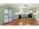 Modern kitchen with stainless steel appliances, lots of cabinets and hardwood floors at 1721 Rachel Dr, Plainfield, IN 46168