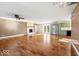 Spacious living room with hardwood floors, fireplace and stainless steel refrigerator at 1721 Rachel Dr, Plainfield, IN 46168