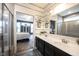 Bathroom featuring double vanity and glass enclosed shower with a view into the bedroom at 19252 Chestnut Grove Ln, Noblesville, IN 46062