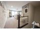 Bright bonus room with custom painted walls, plush carpet, and a ceiling fan at 19252 Chestnut Grove Ln, Noblesville, IN 46062