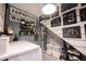 Farmhouse-style laundry room featuring rustic decor and under-stair storage at 19252 Chestnut Grove Ln, Noblesville, IN 46062
