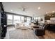 Bright living space showcasing natural light, inviting seating, and connected living spaces at 19252 Chestnut Grove Ln, Noblesville, IN 46062
