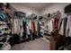 Spacious walk-in closet with ample shelving and hanging space to keep your wardrobe organized at 19252 Chestnut Grove Ln, Noblesville, IN 46062