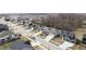 A high angle shot of a neighborhood featuring meticulously maintained homes and serene streetscapes at 19966 Chatham Green Dr, Westfield, IN 46074