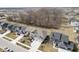 Aerial view of a neighborhood showcasing well-maintained homes and manicured lawns at 19966 Chatham Green Dr, Westfield, IN 46074