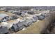 A cozy residential area features well-maintained homes, neat lawns, and a playground within the community at 19966 Chatham Green Dr, Westfield, IN 46074
